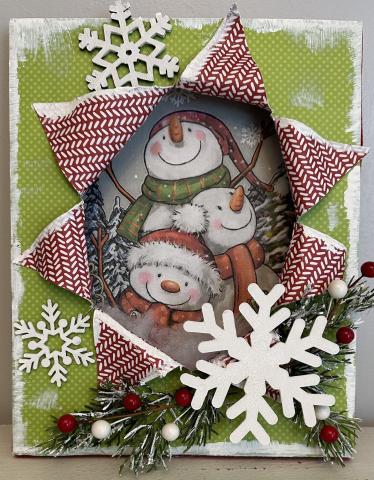 snowmen peeking through a winter decorated canvas