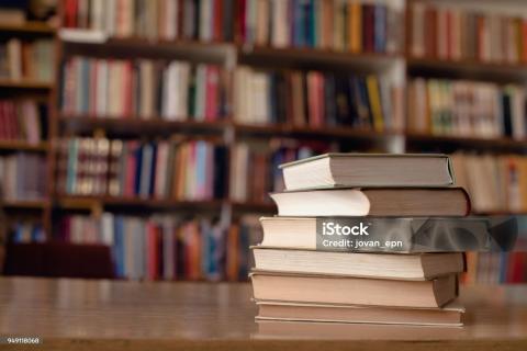 a stack of books in a library