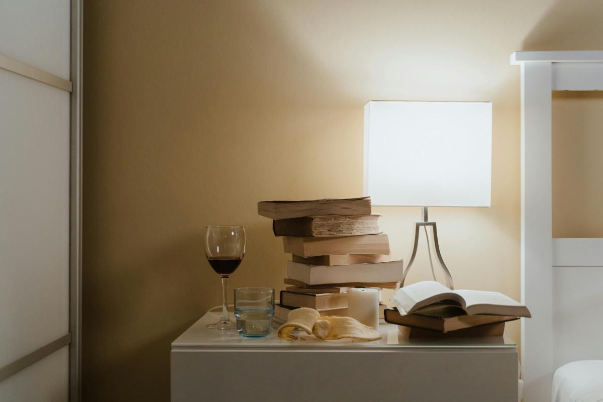 books on a bedside table